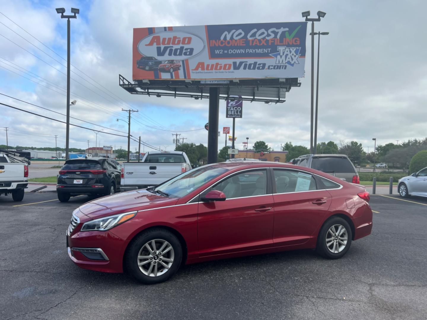 2015 RED Hyundai Sonata ECO (5NPE24AF8FH) with an 1.6L L4 DOHC 16V engine, 7-Speed Automatic transmission, located at 420 I-35E, Lancaster, TX, 75146, (469) 297-4144, 32.593929, -96.823685 - Photo#0